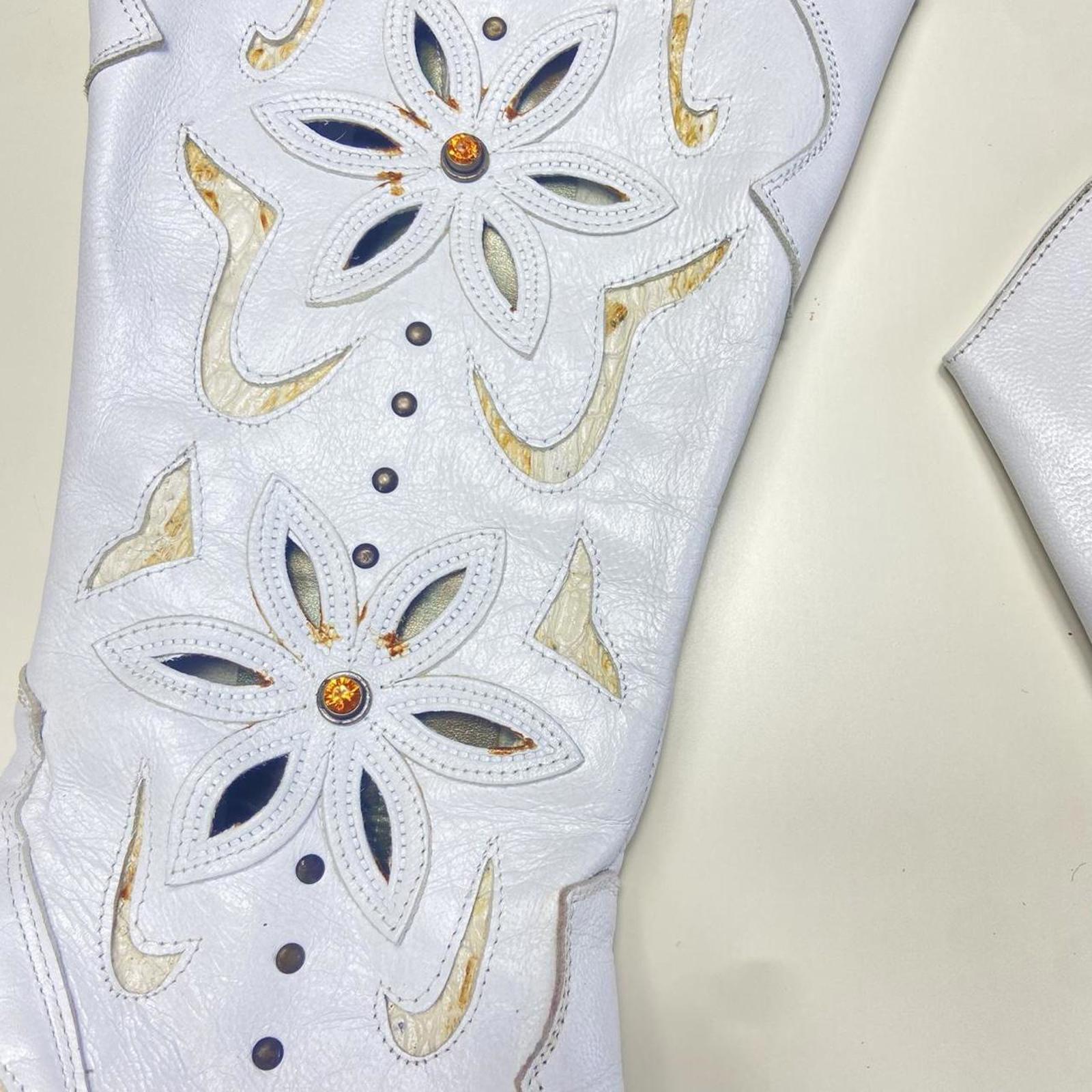 Vintage white patterned boho gem embelished heeled boots.