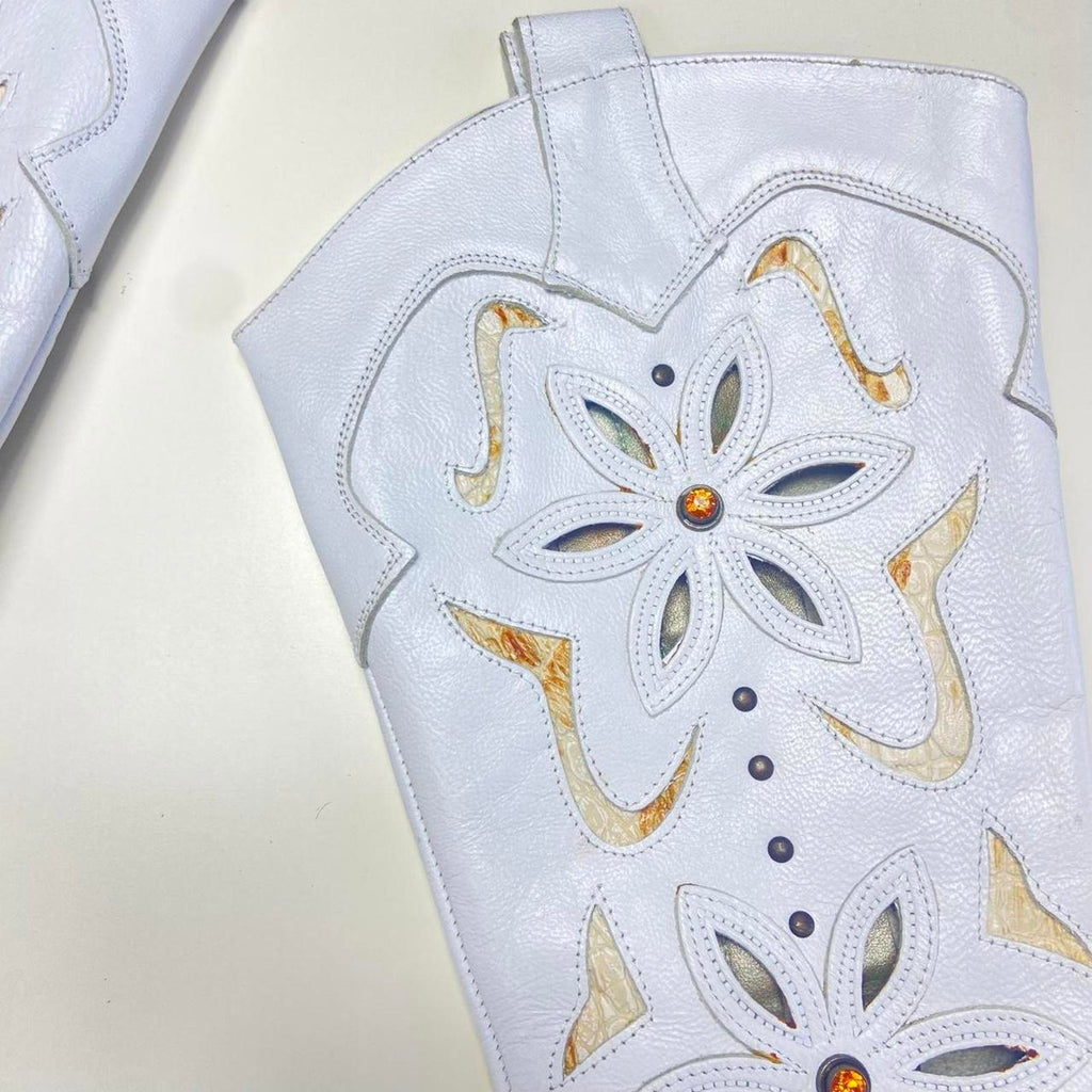 Vintage white patterned boho gem embelished heeled boots.