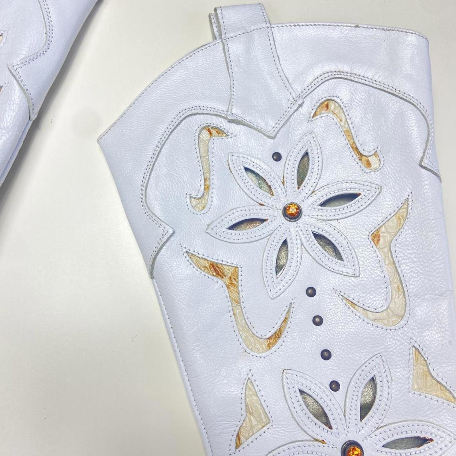 Vintage white patterned boho gem embelished heeled boots.