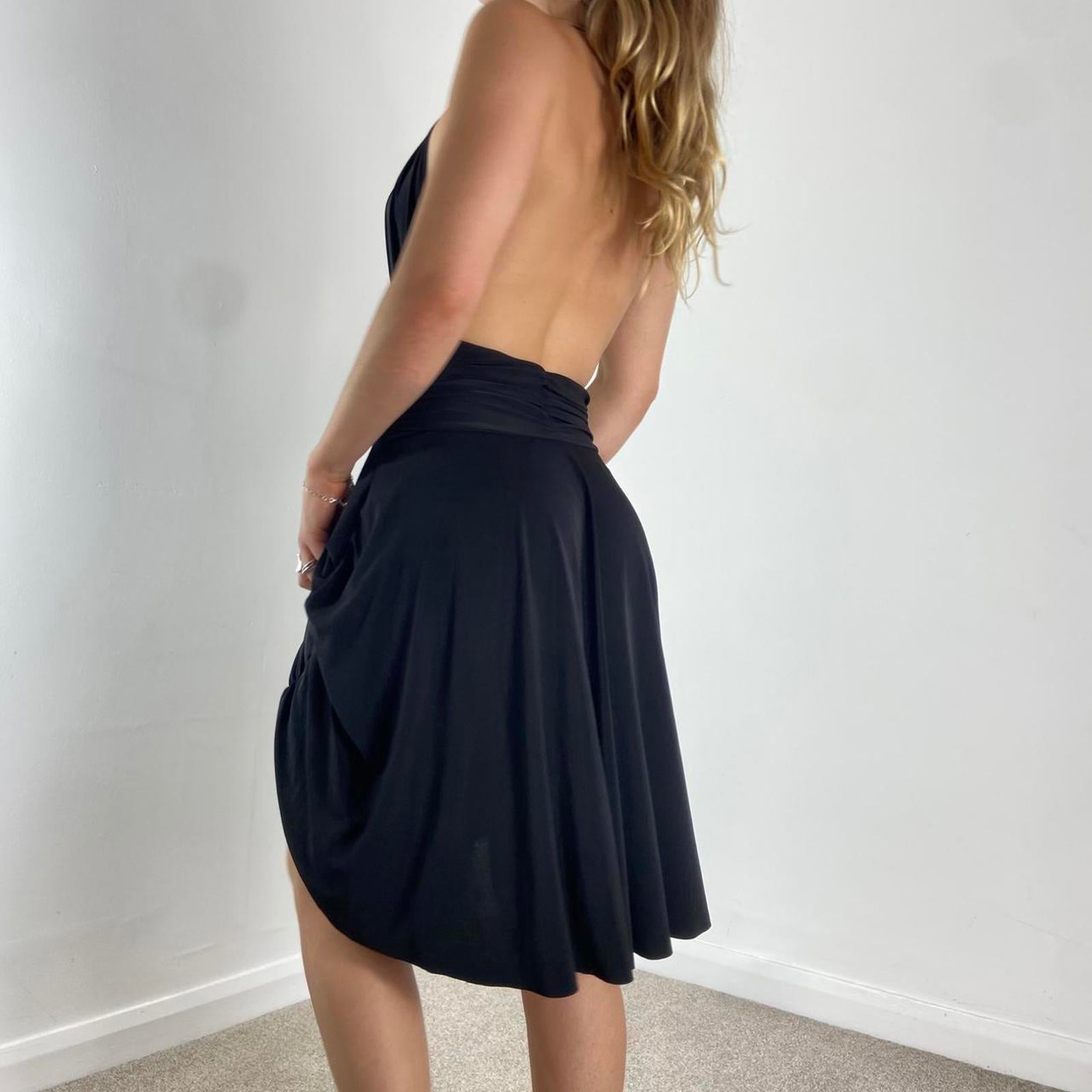 V neck black dance dress with a low cut back and beautiful silver sequins in the middle