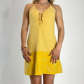 00's yellow sun dress with patterned hem and ties in the middle