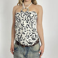 Retro white and black elasticated top with a wooden ring