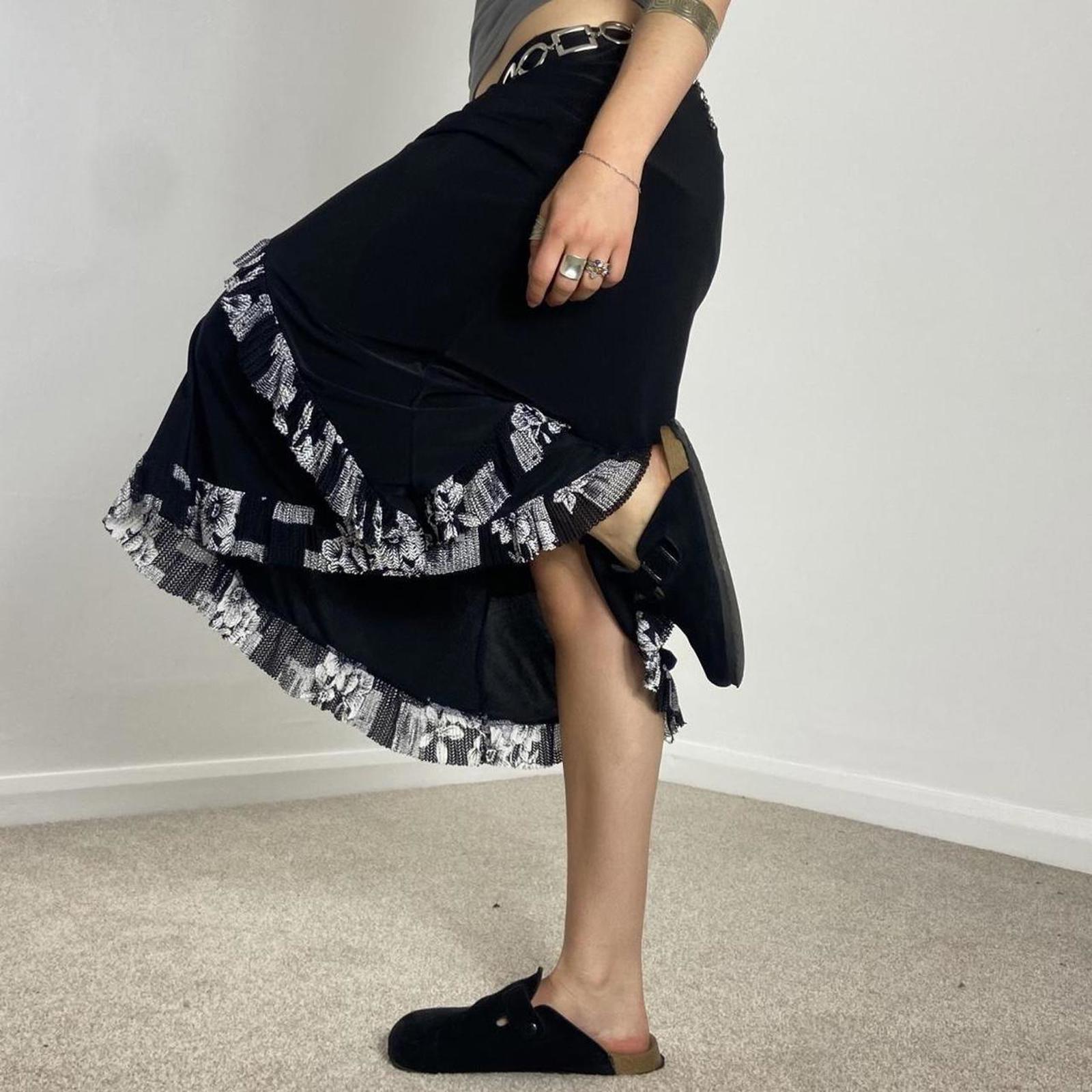Vintage black and white maxi skirt with a floral white wrap around lettuce hem!