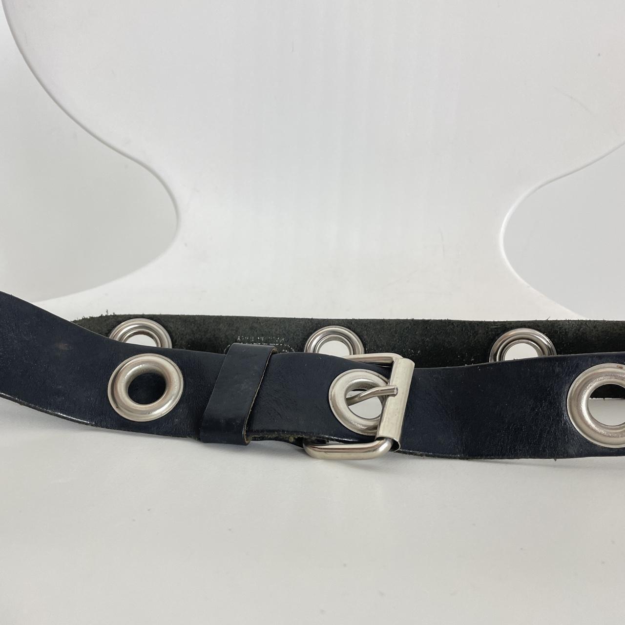 Black leather belts with silver grommets