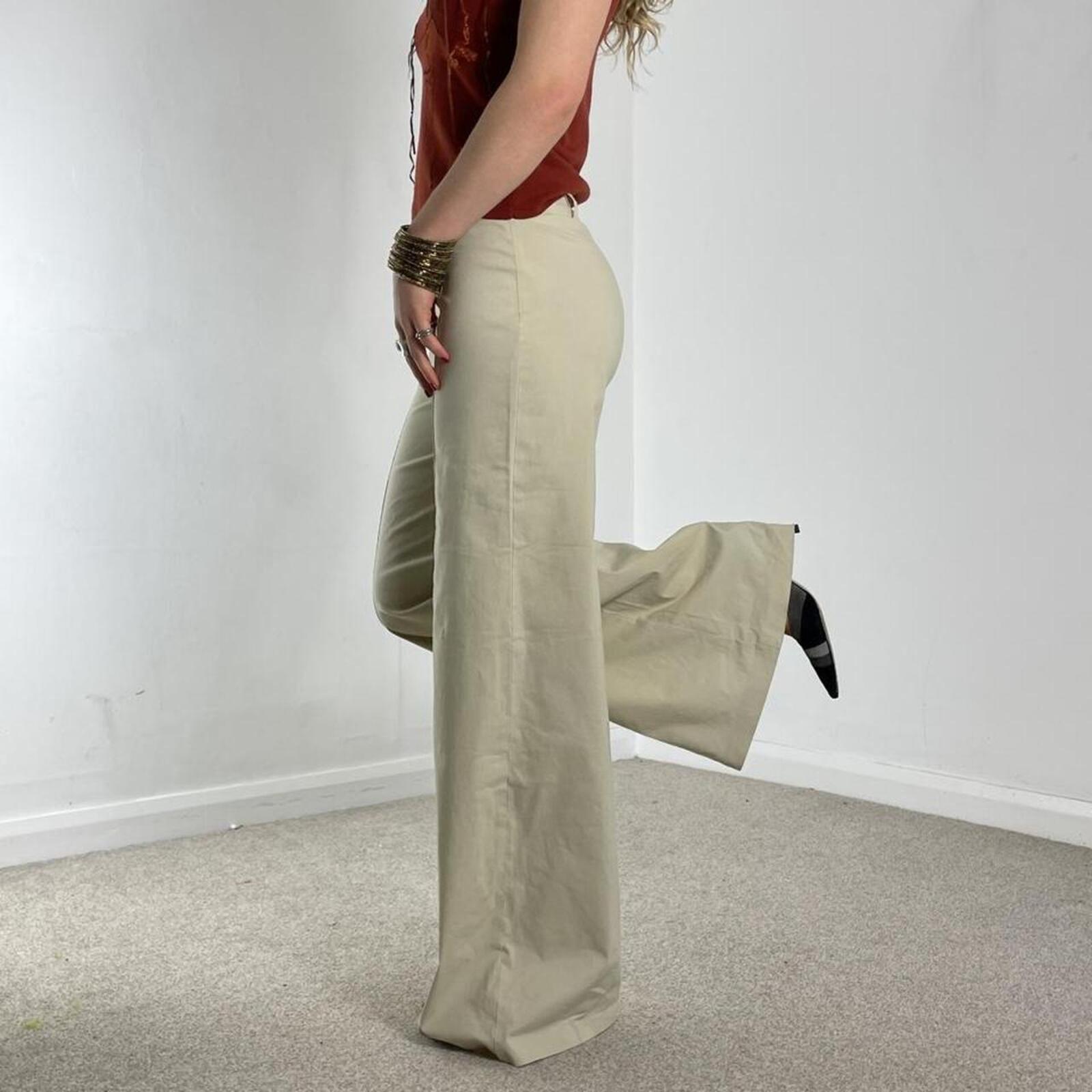 Low-rise cream bell flared high rise trousers
