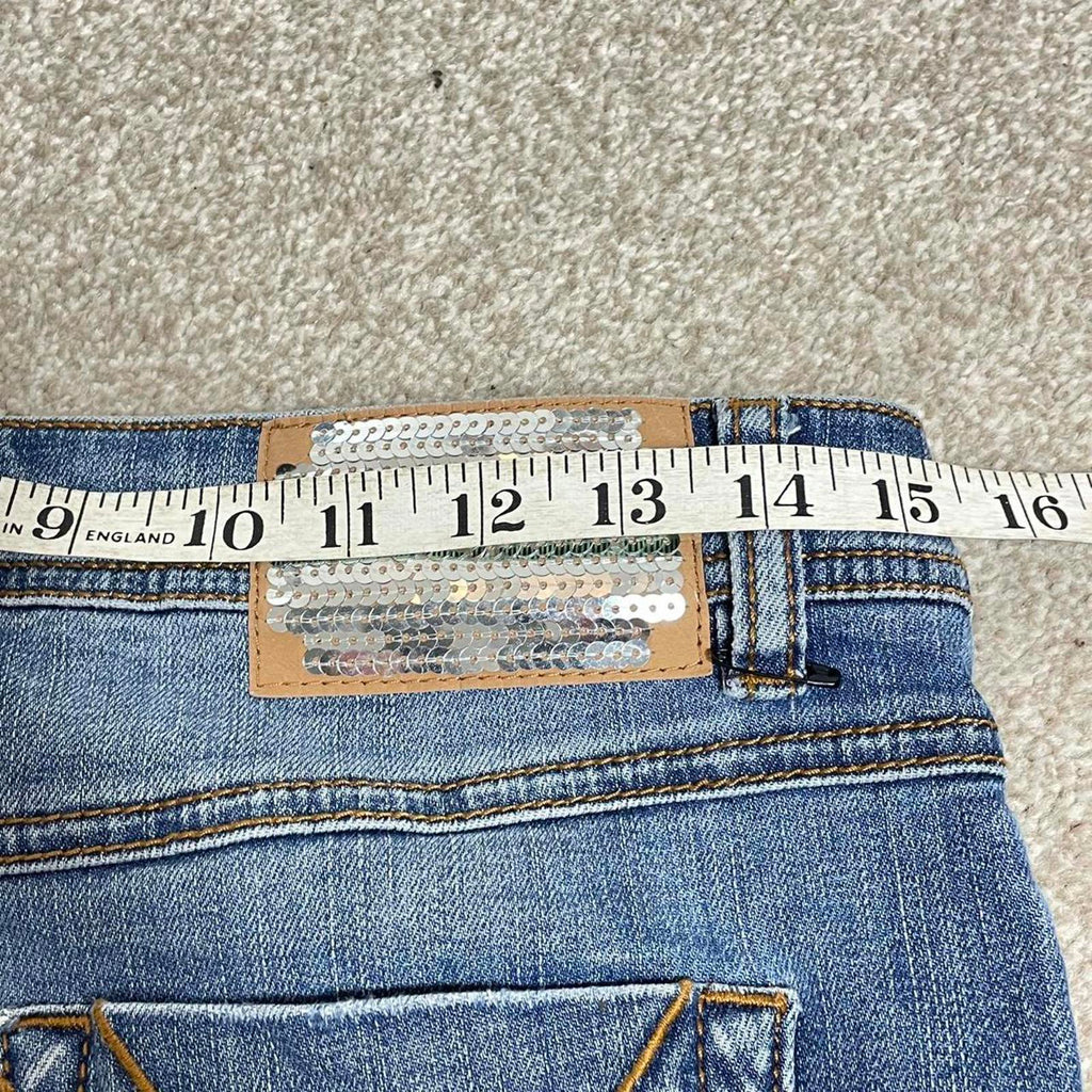 Y2k denim micro skirt with silver sequined patch at the back