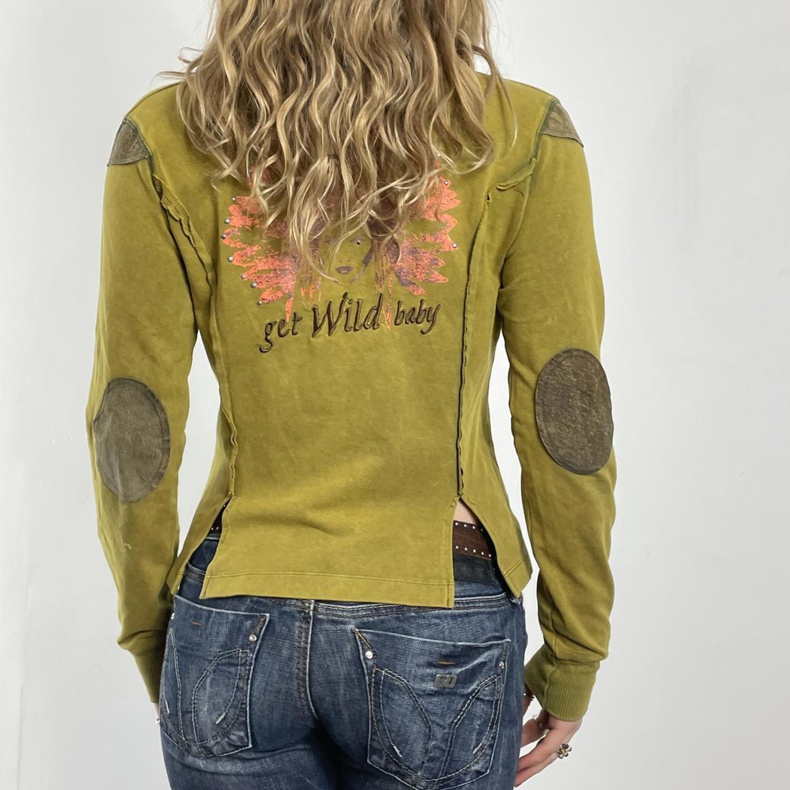 Vintage green avant garde zip up jacket with embroided details on the back and pockets.