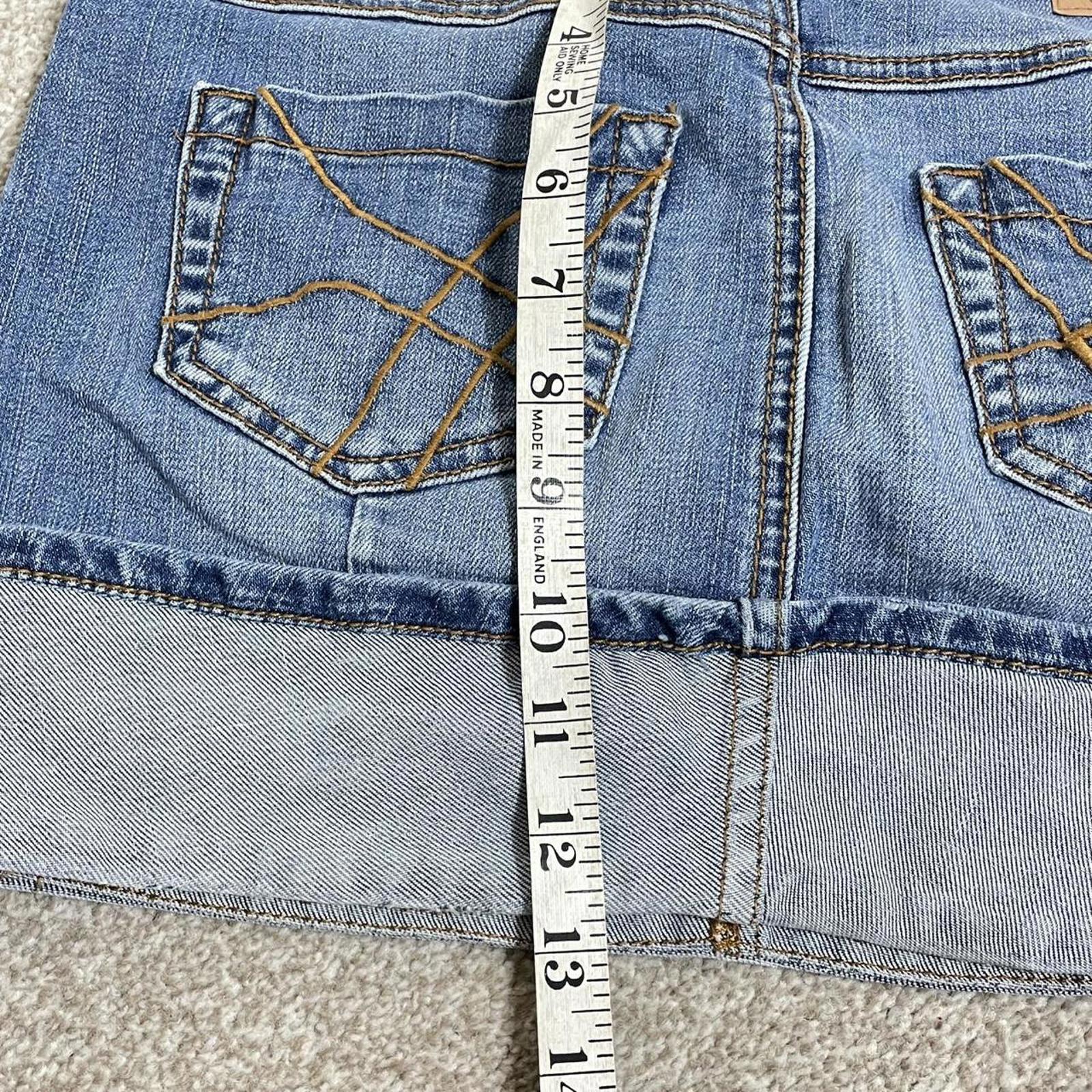 Y2k denim micro skirt with silver sequined patch at the back