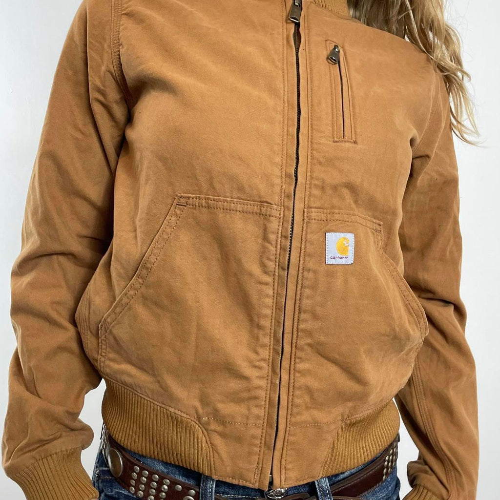 Carhartt fitted mustard canvas jacket with the logo on the side, zips up