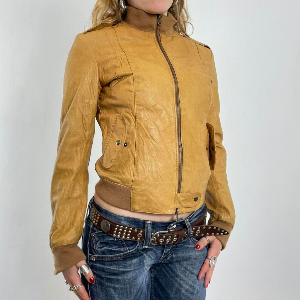 Vintage mustard fitted leather jacket with thick waist band, cool pockets.