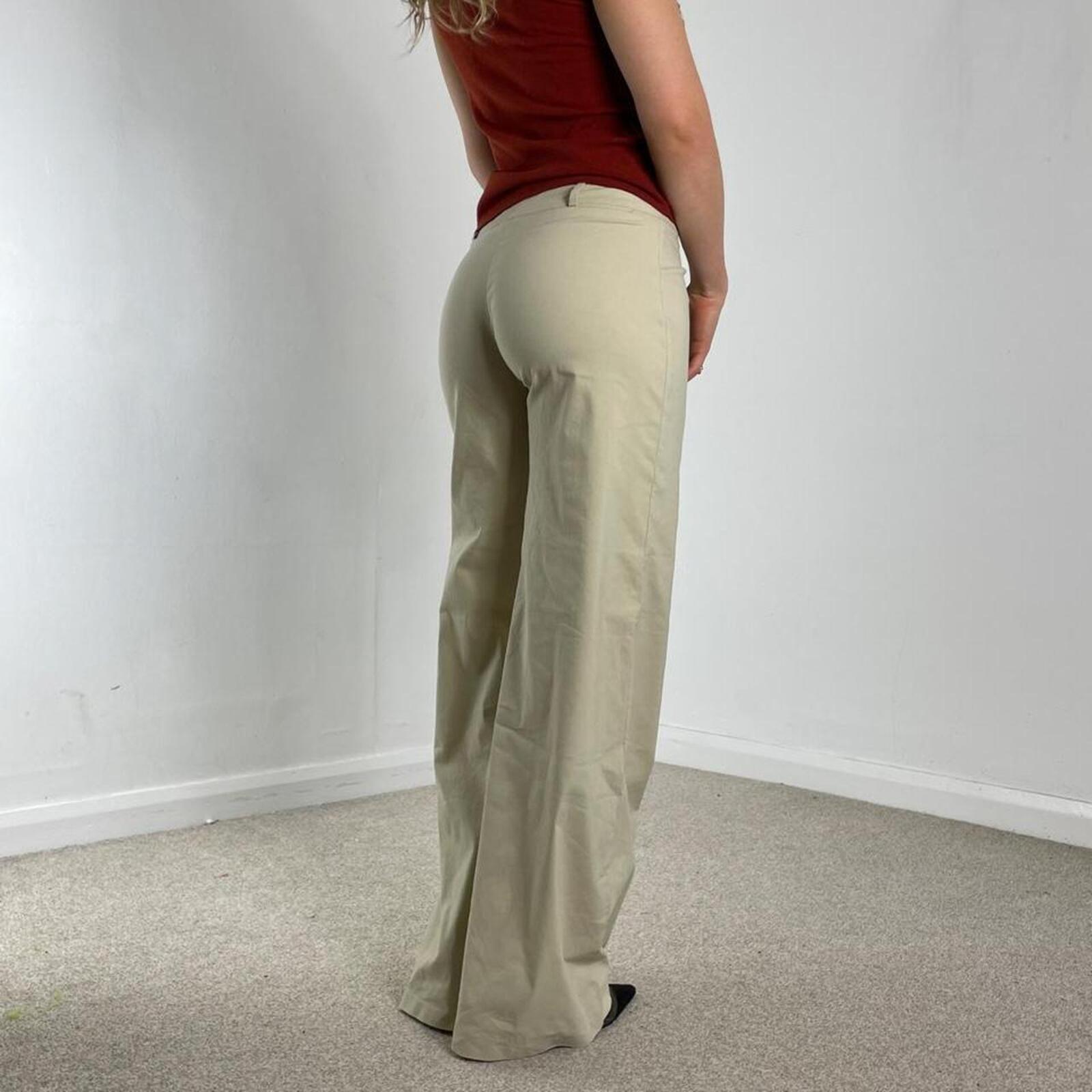 Low-rise cream bell flared high rise trousers