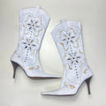 Vintage white patterned boho gem embelished heeled boots.