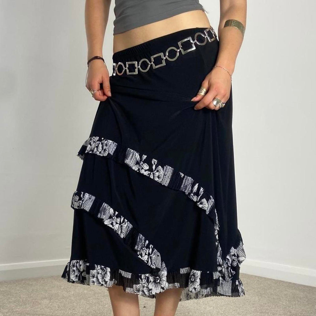 Vintage black and white maxi skirt with a floral white wrap around lettuce hem!