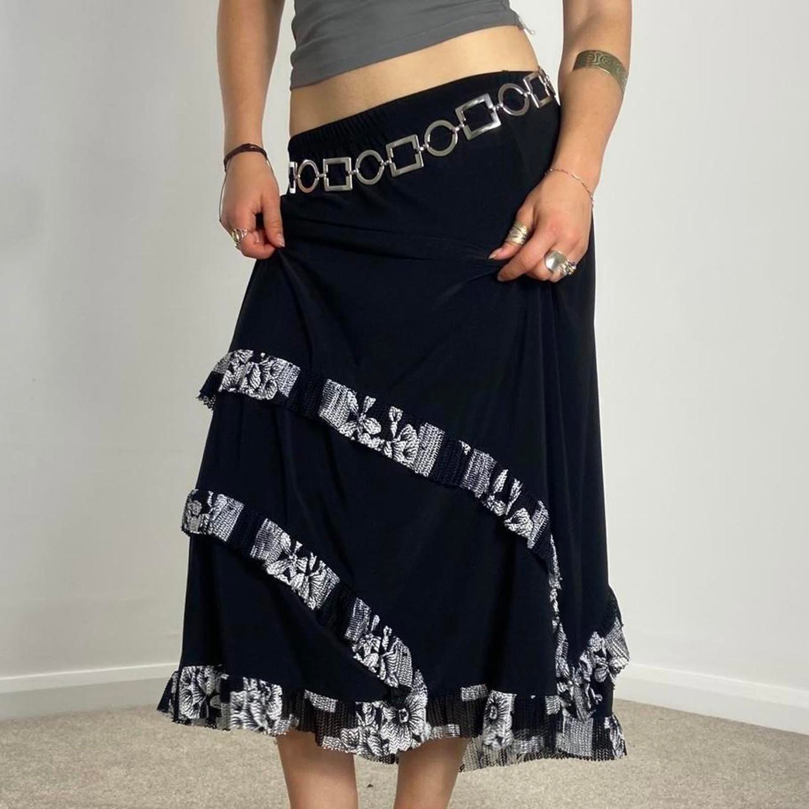 Vintage black and white maxi skirt with a floral white wrap around lettuce hem!