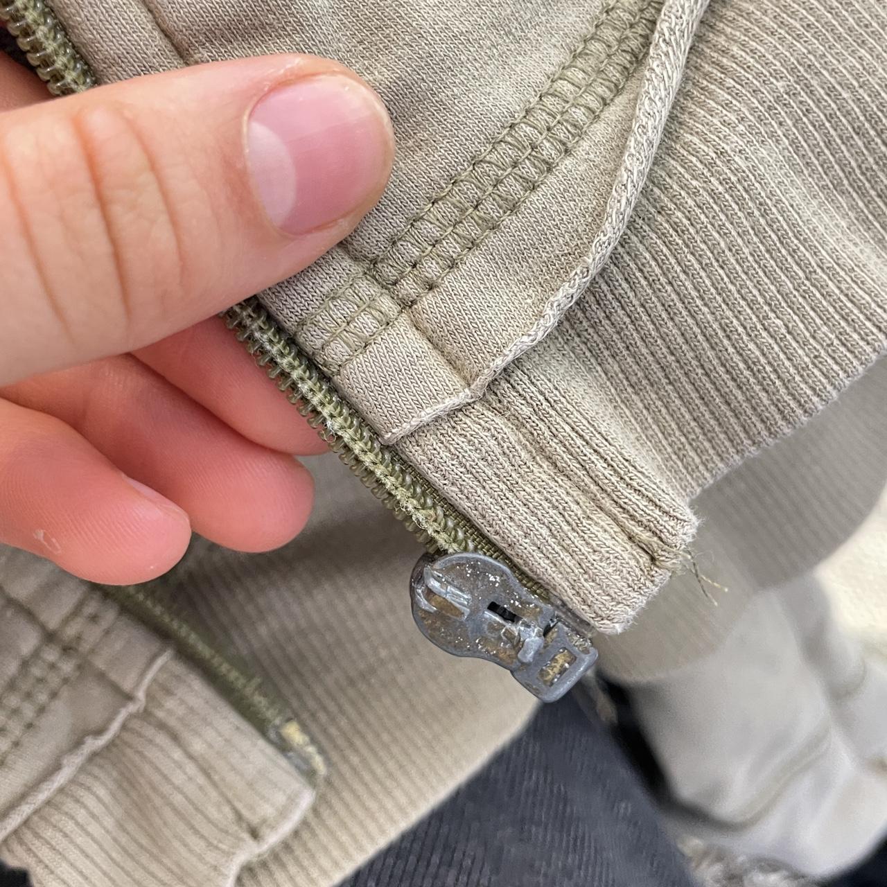 Graphic spell out khaki zip up jumper