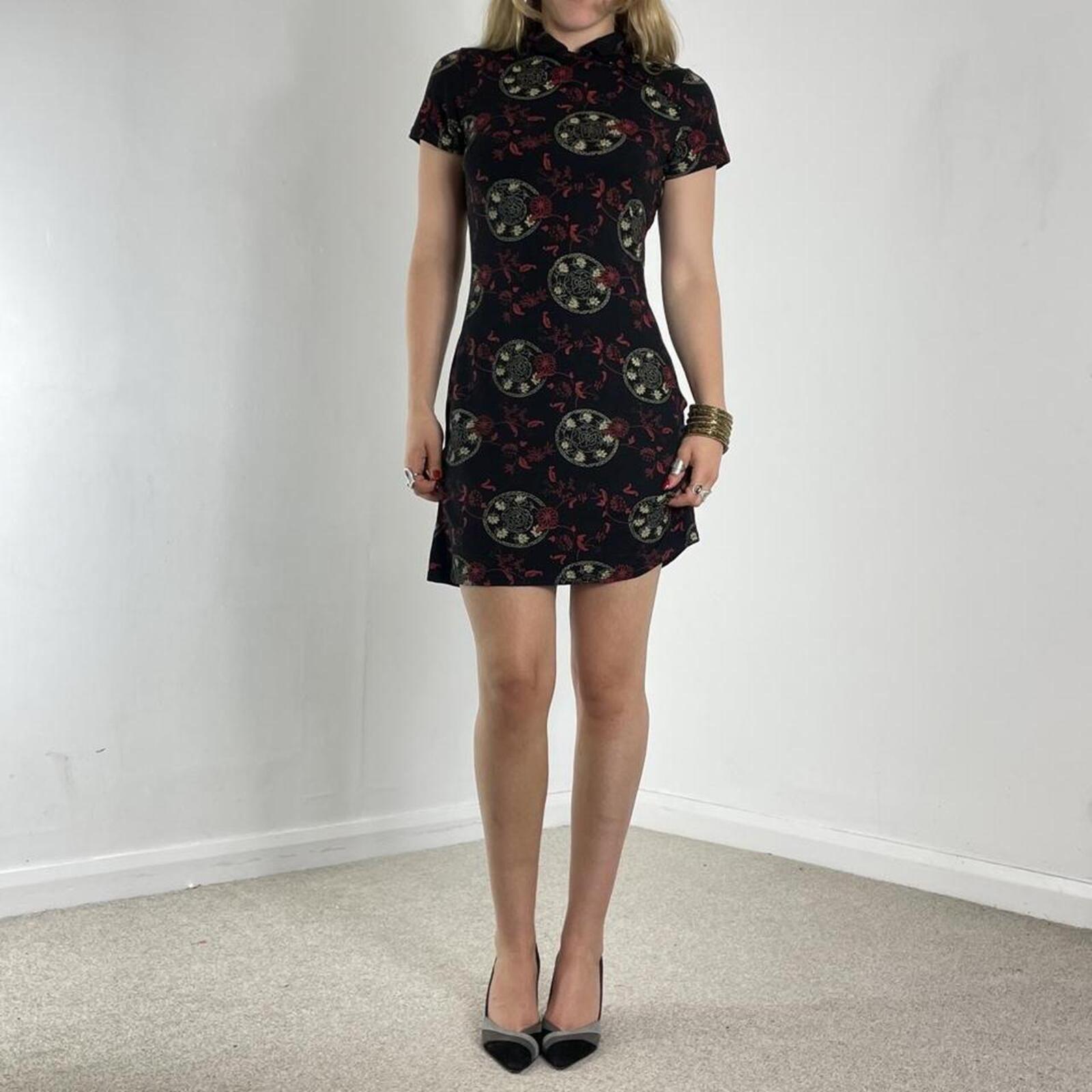 Black high-neck midi dress with print