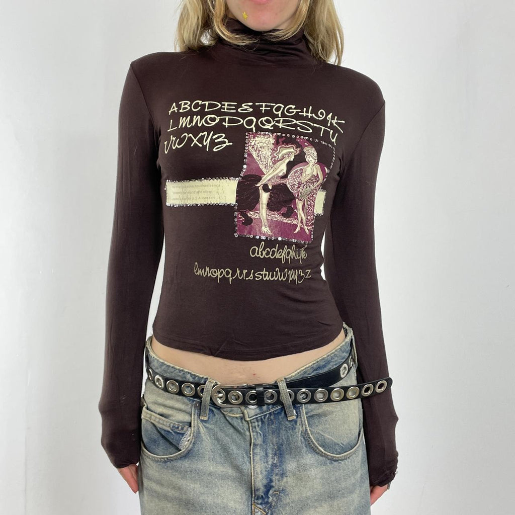 Graphic soft high neck long sleeve top with bold patterning on the front