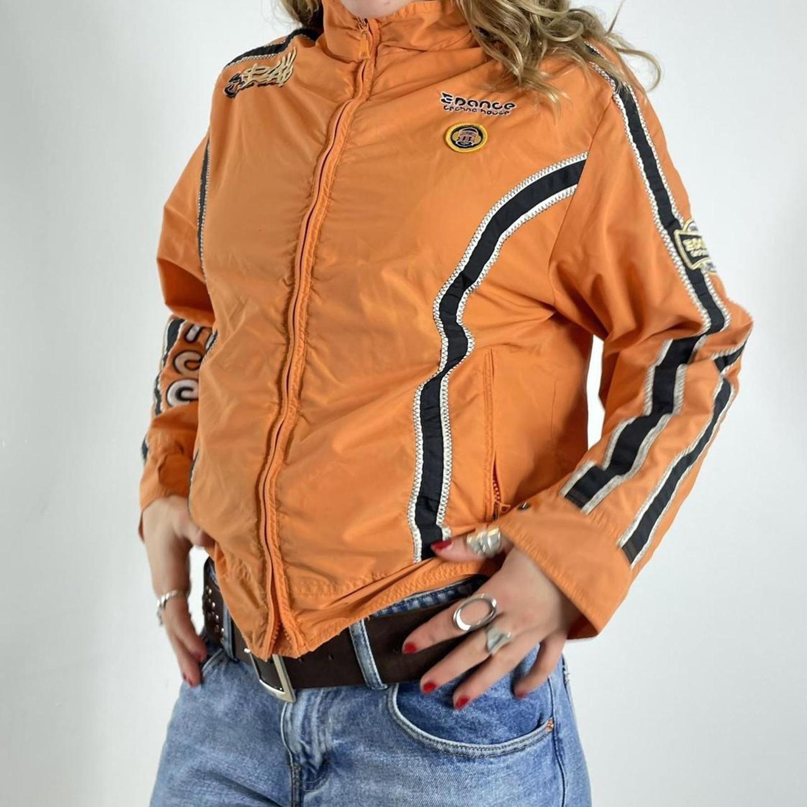Orange racer windbreaker jacket with graphic detailing