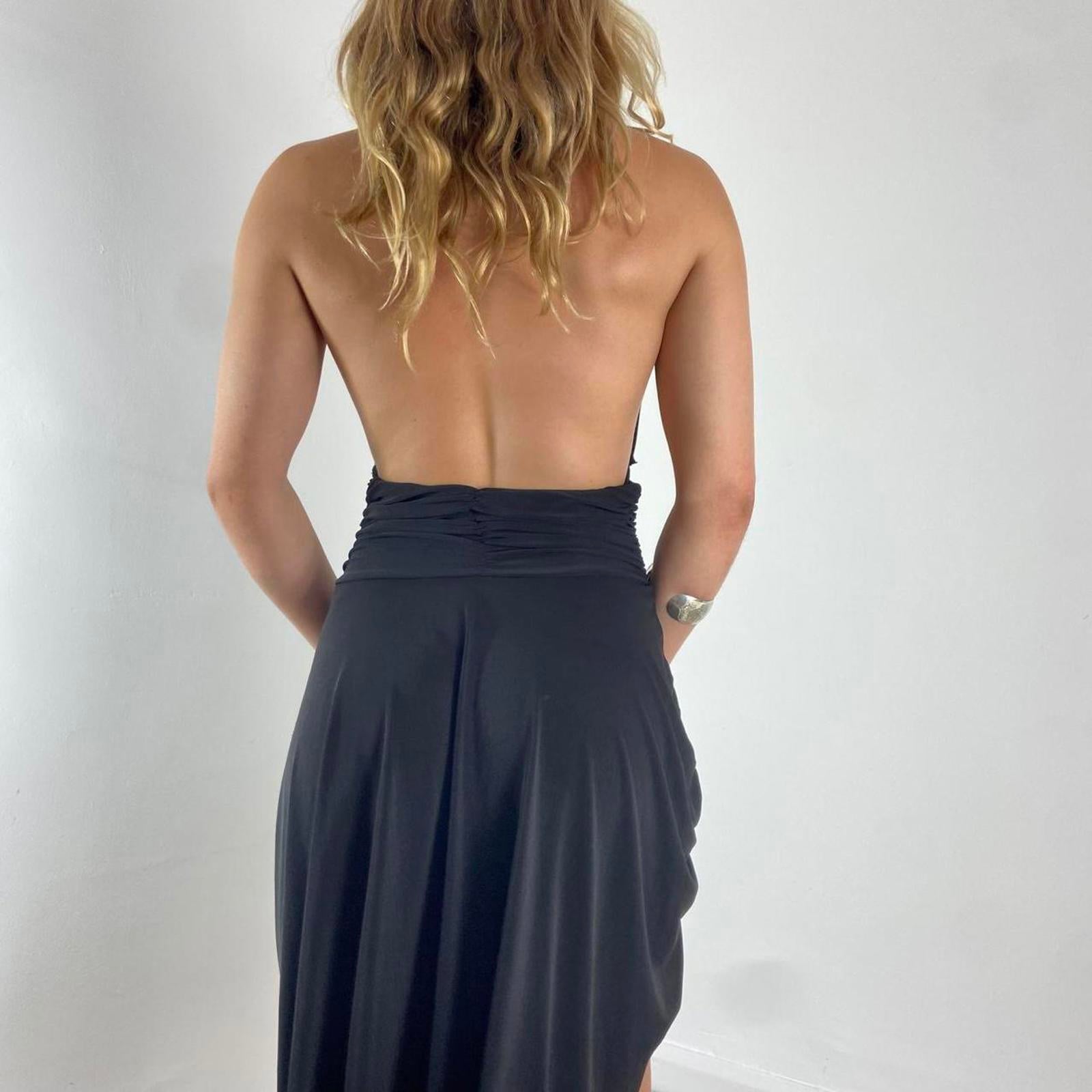 V neck black dance dress with a low cut back and beautiful silver sequins in the middle