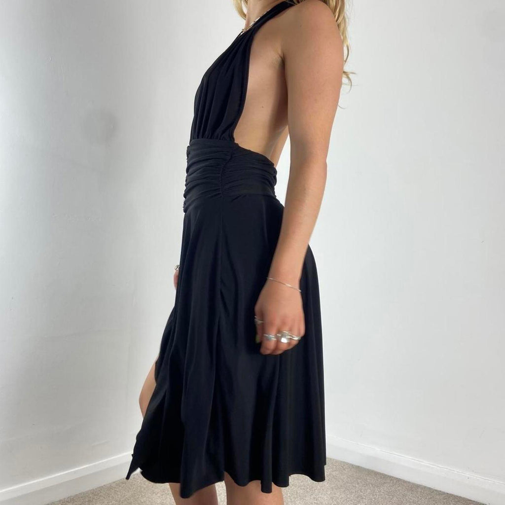 V neck black dance dress with a low cut back and beautiful silver sequins in the middle