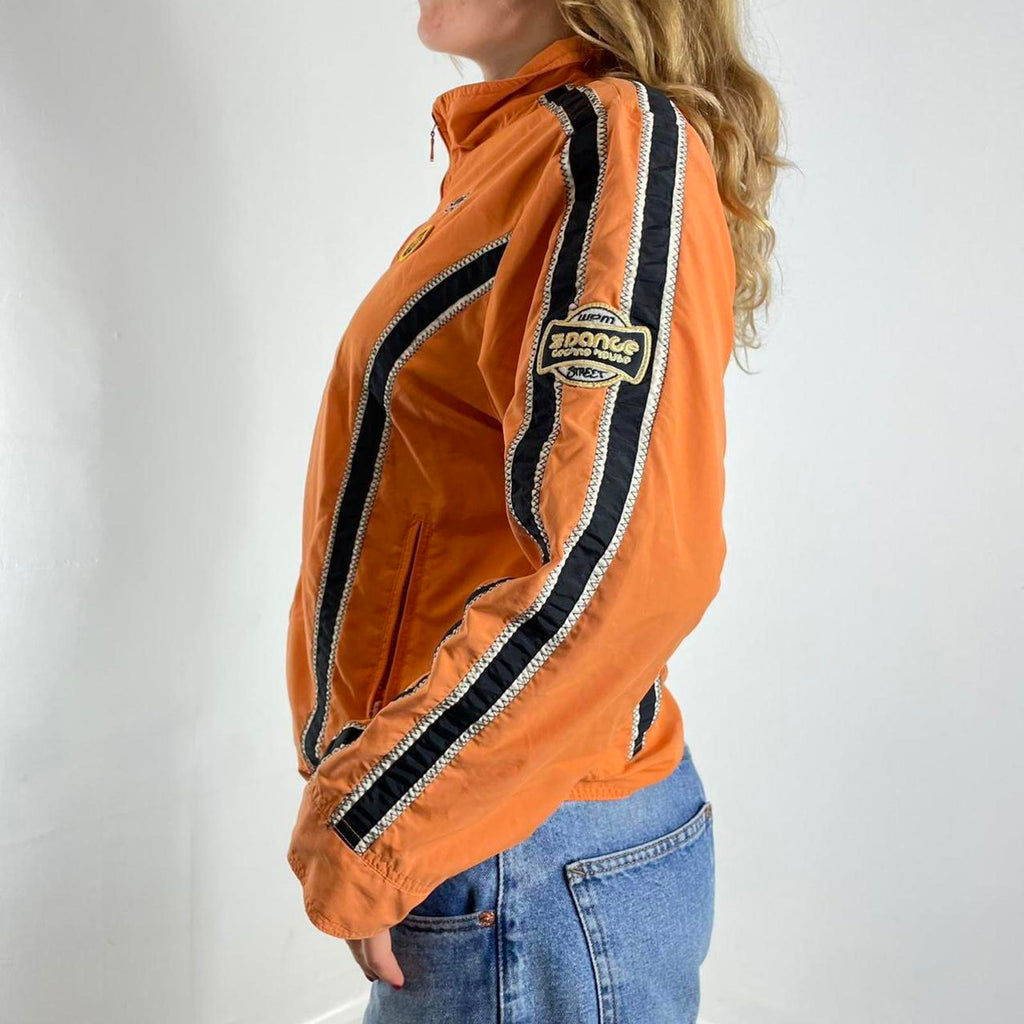 Orange racer windbreaker jacket with graphic detailing