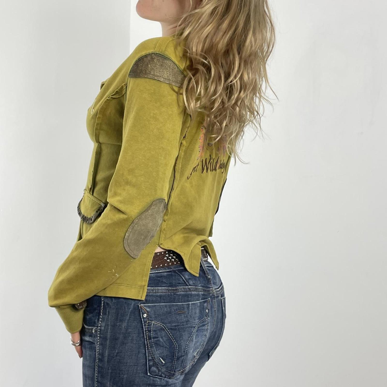 Vintage green avant garde zip up jacket with embroided details on the back and pockets.