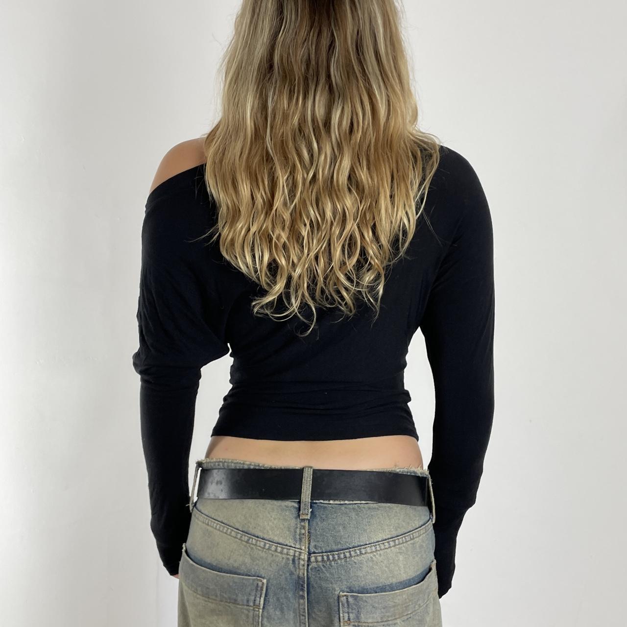 Black and blue graphic batwing top