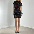 Black high-neck midi dress with print