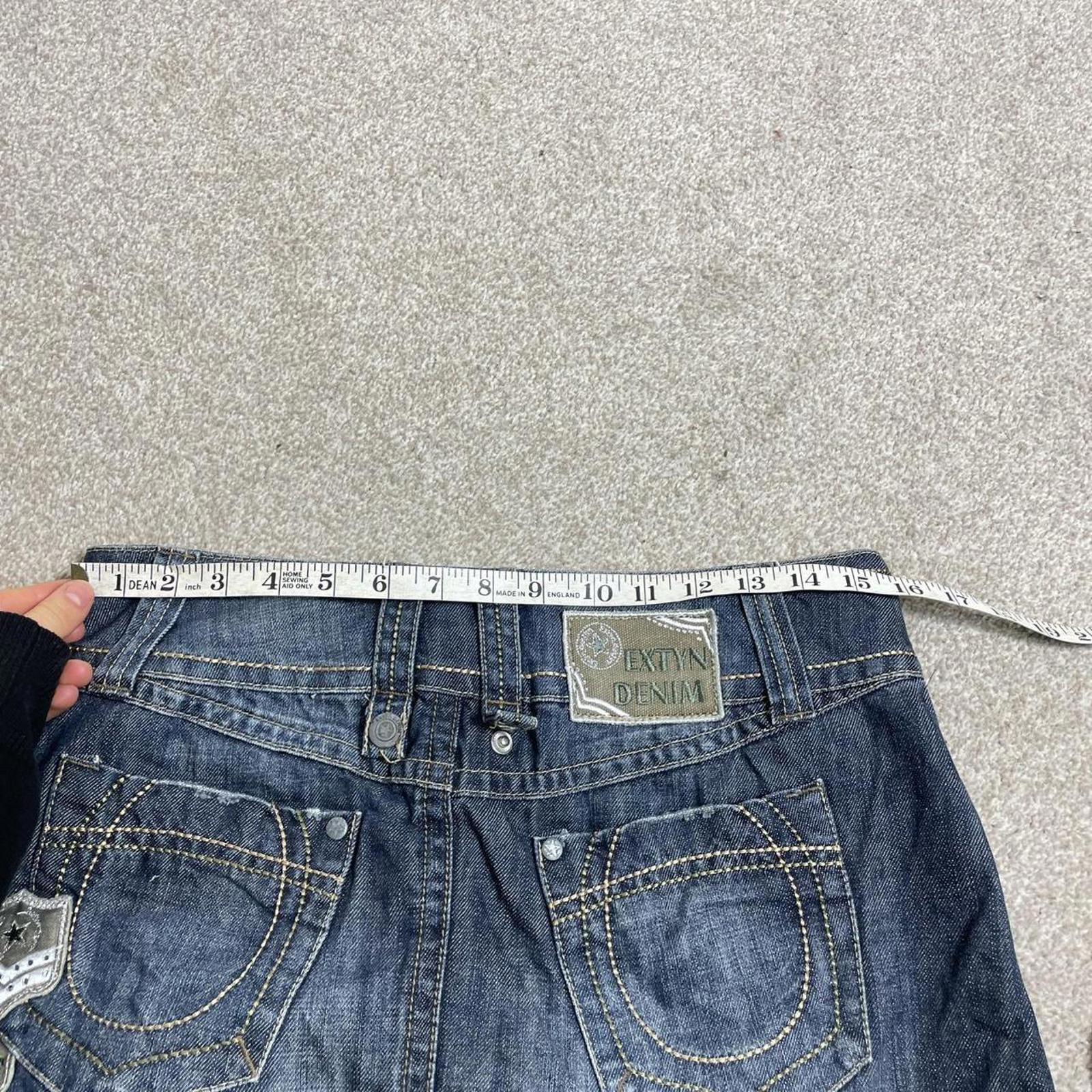 Y2K denim lowrise pleated contrastiching mini skirt with patches embroided on the back
