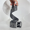 Studded silver belt on black leather