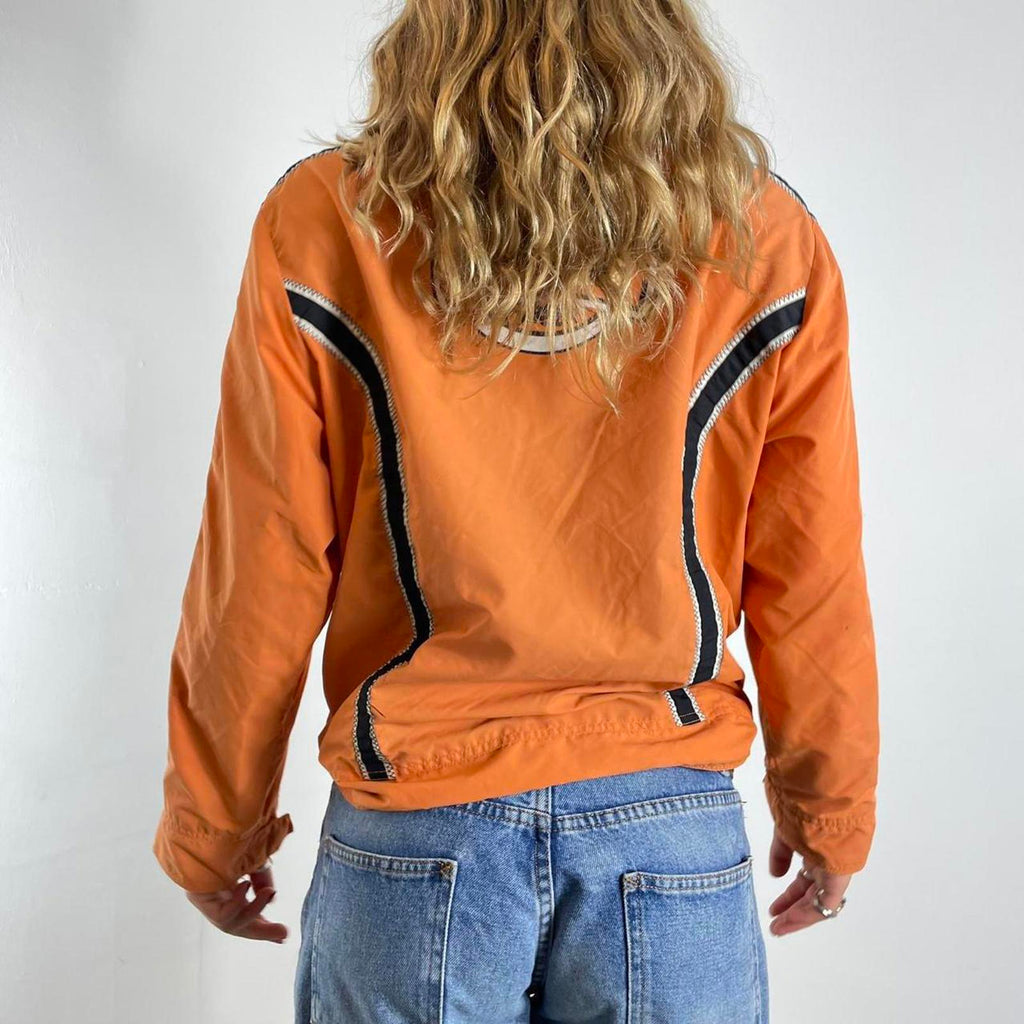 Orange racer windbreaker jacket with graphic detailing