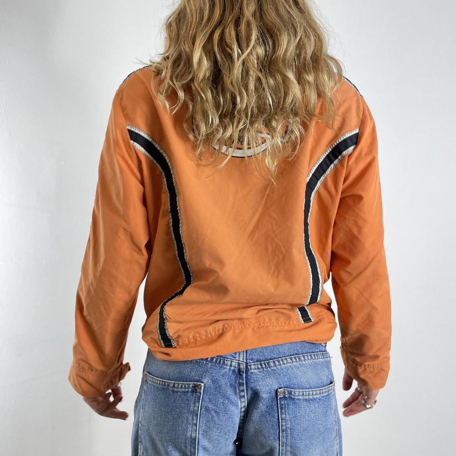 Orange racer windbreaker jacket with graphic detailing