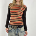 Unique orange and brown striped top with a wool back !