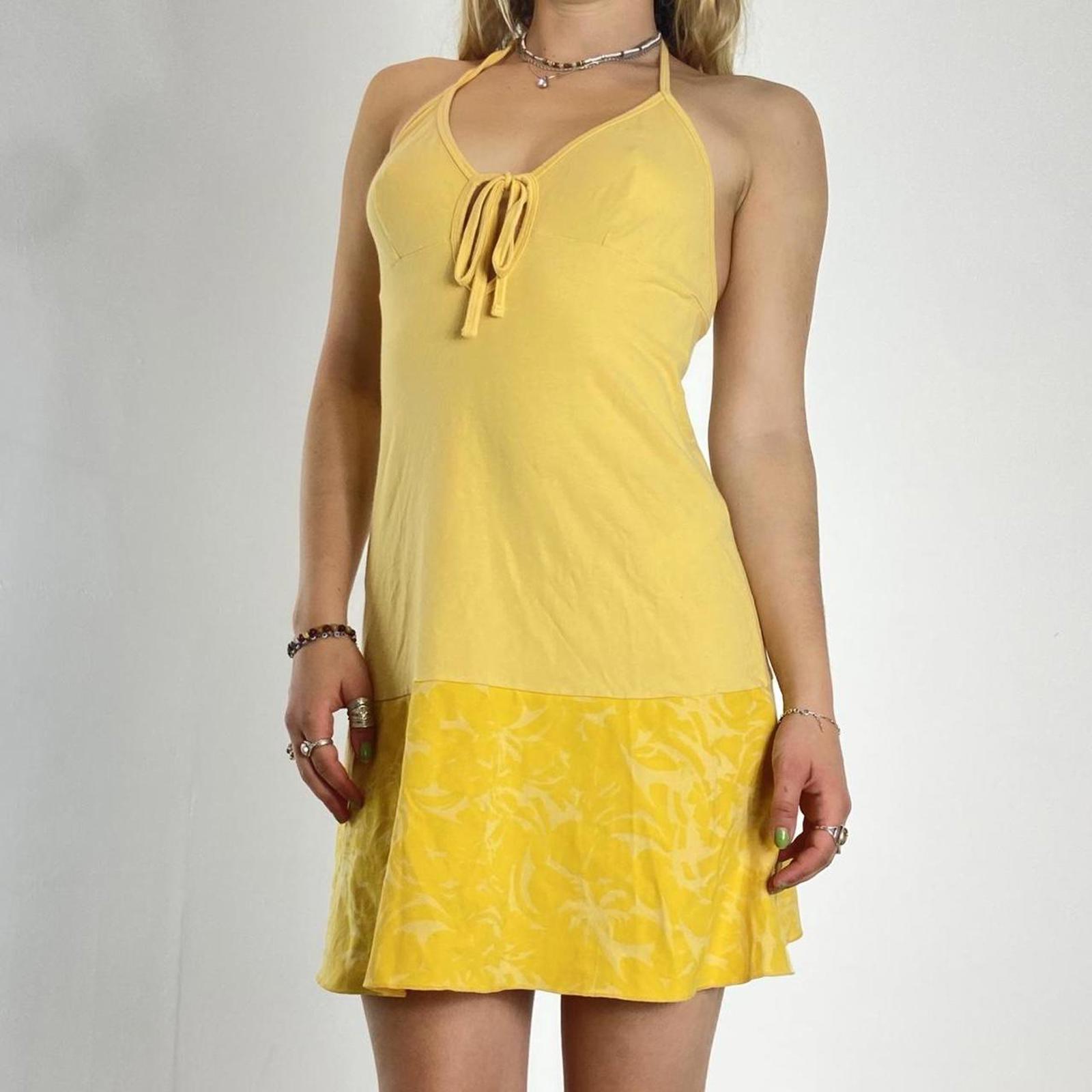 00's yellow sun dress with patterned hem and ties in the middle