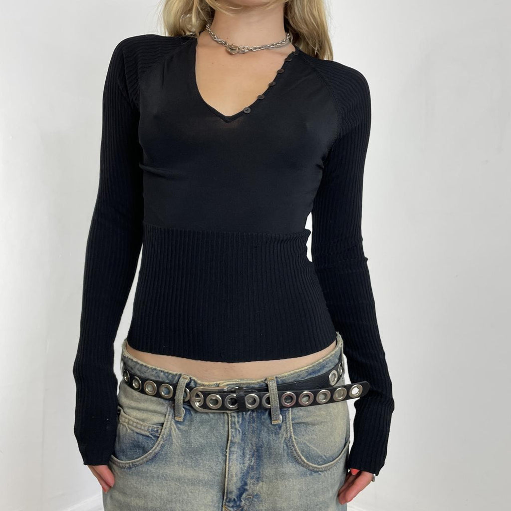 Black fitted long sleeve with a ribbed waist band