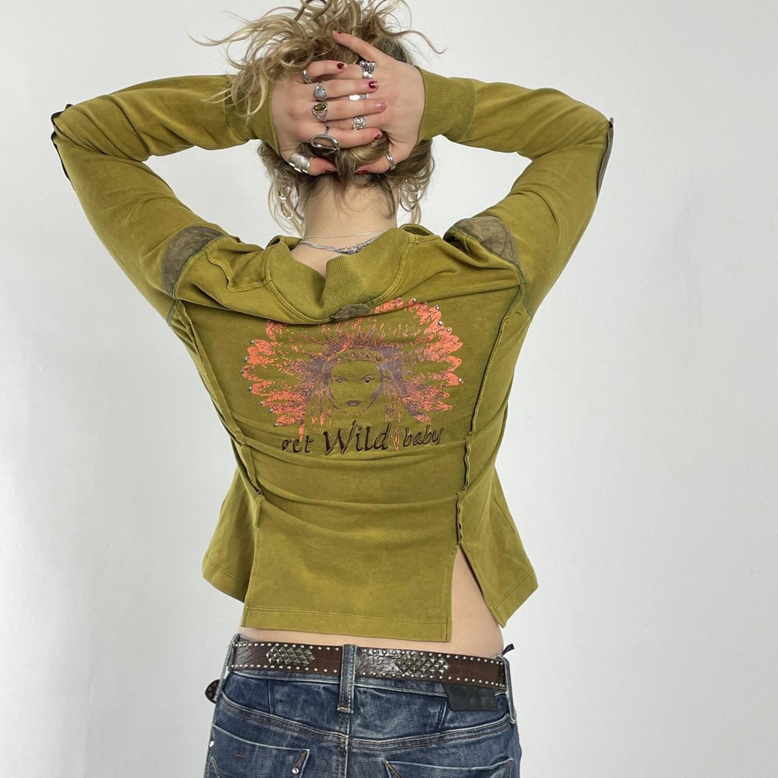 Vintage green avant garde zip up jacket with embroided details on the back and pockets.