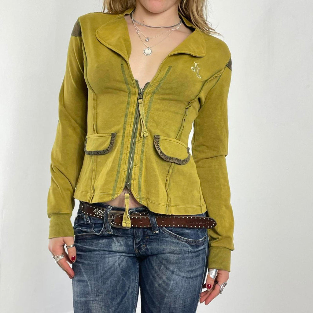 Vintage green avant garde zip up jacket with embroided details on the back and pockets.
