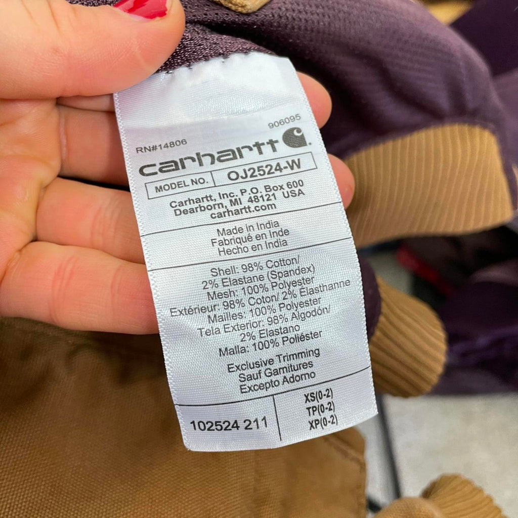 Carhartt fitted mustard canvas jacket with the logo on the side, zips up