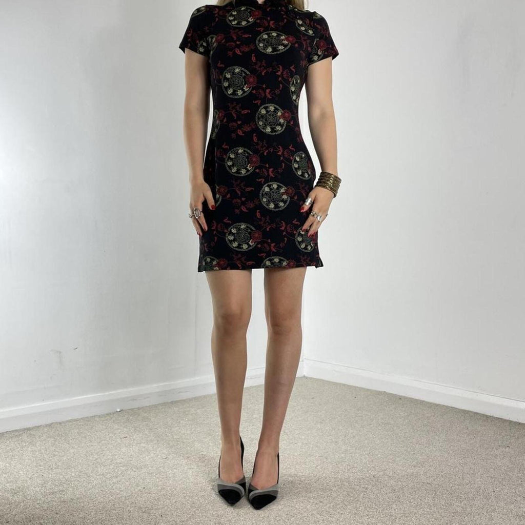 Black high-neck midi dress with print