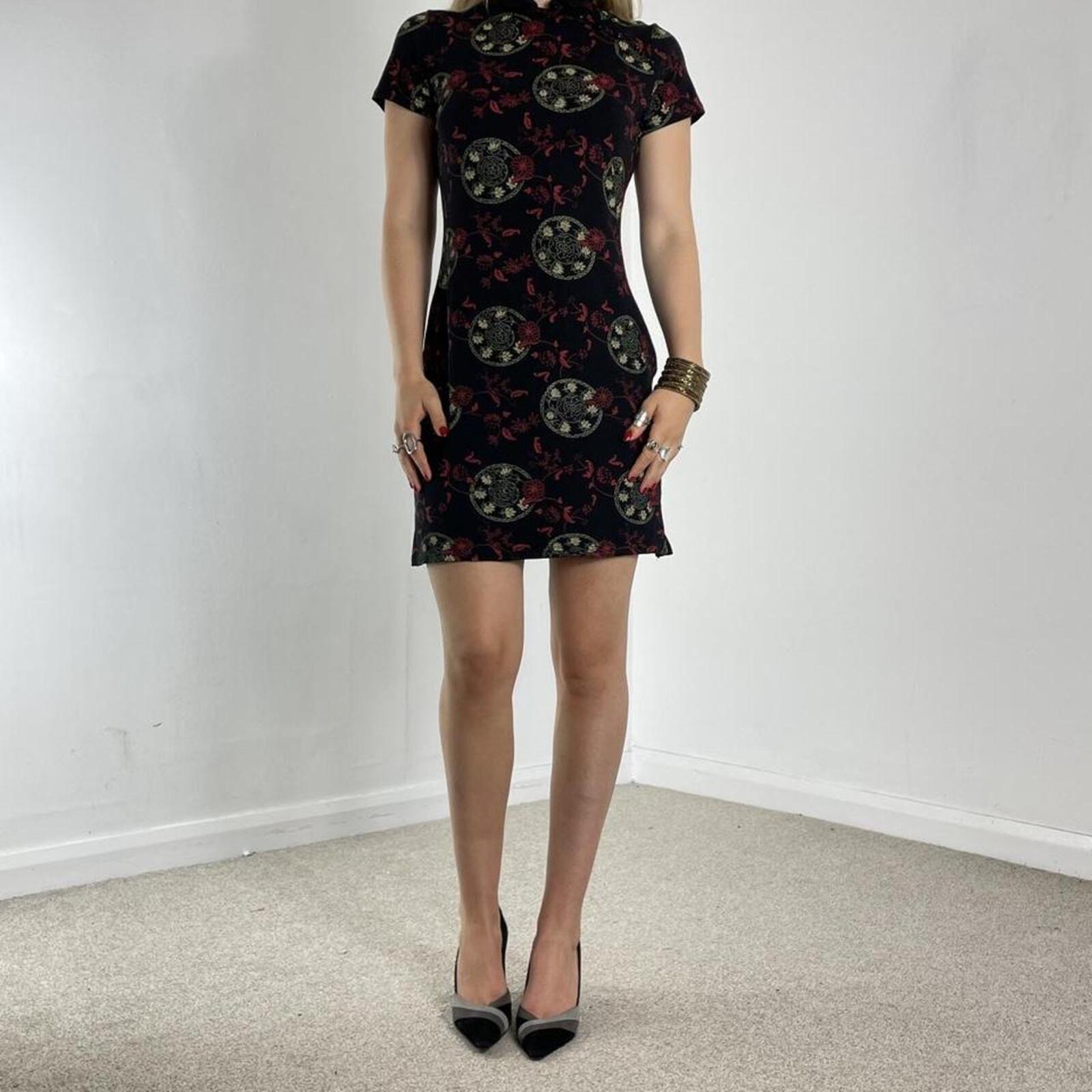 Black high-neck midi dress with print