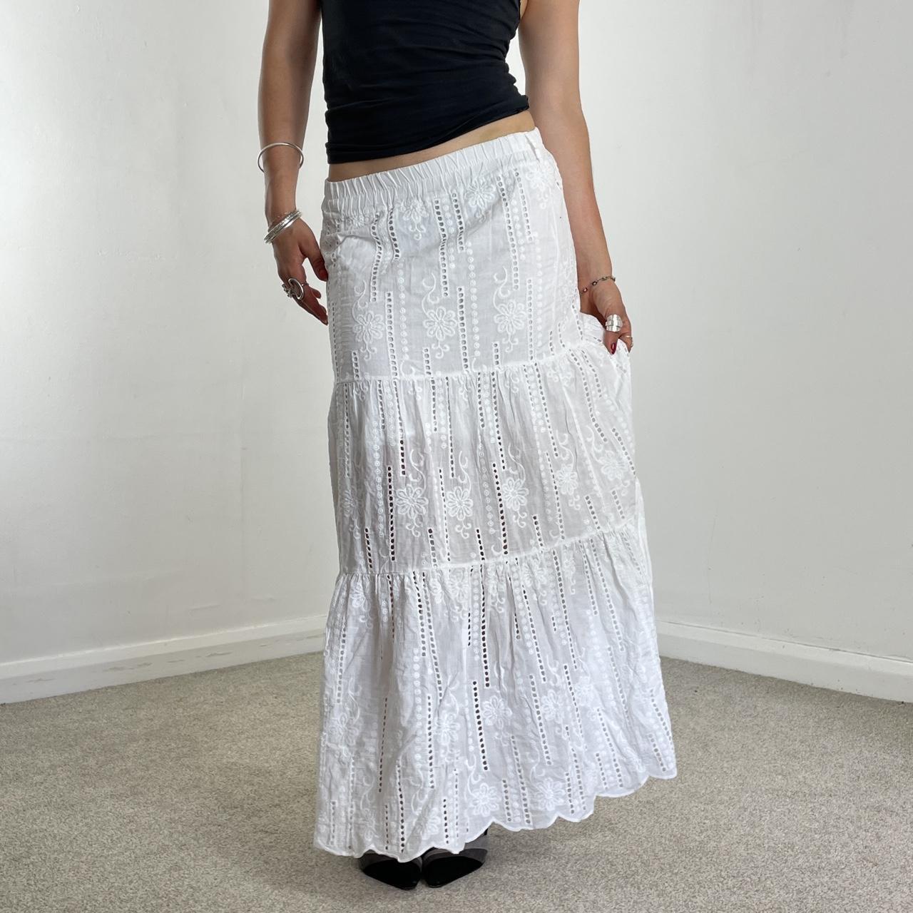 Vintage full length teired maxi skirt with embroided details.