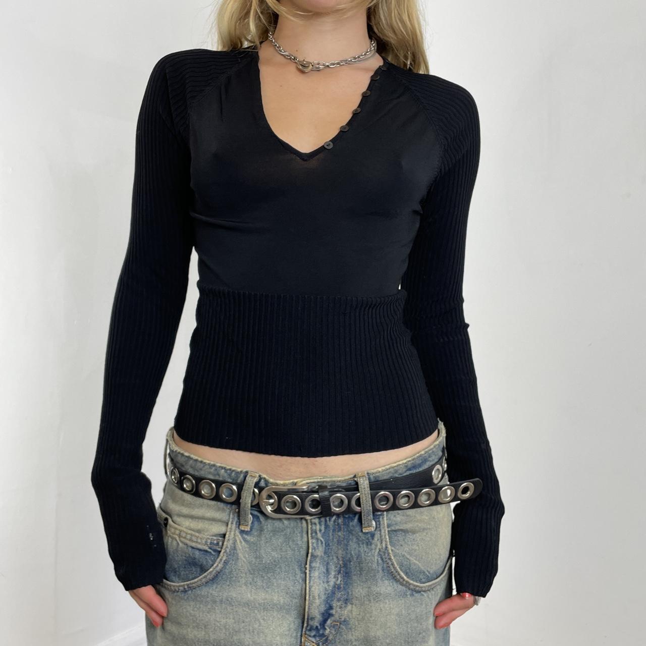 Black fitted long sleeve with a ribbed waist band