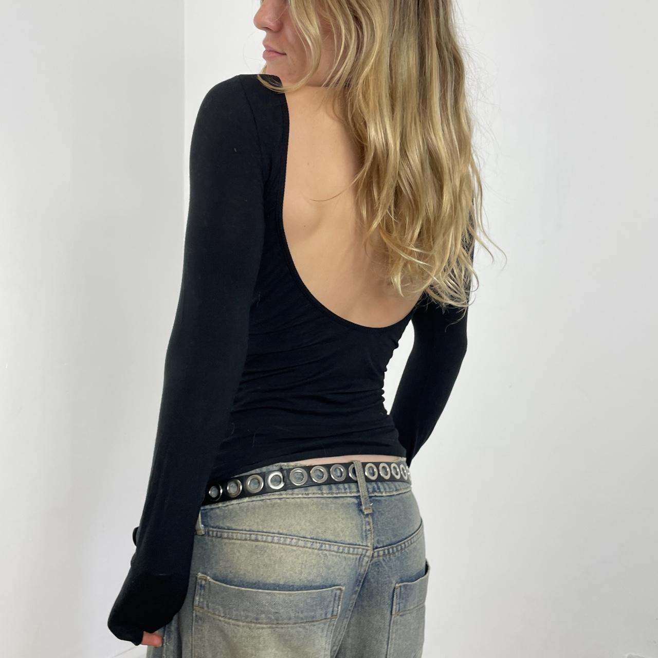 Graphic gold and black Denny rose spell out long sleeve with a low back