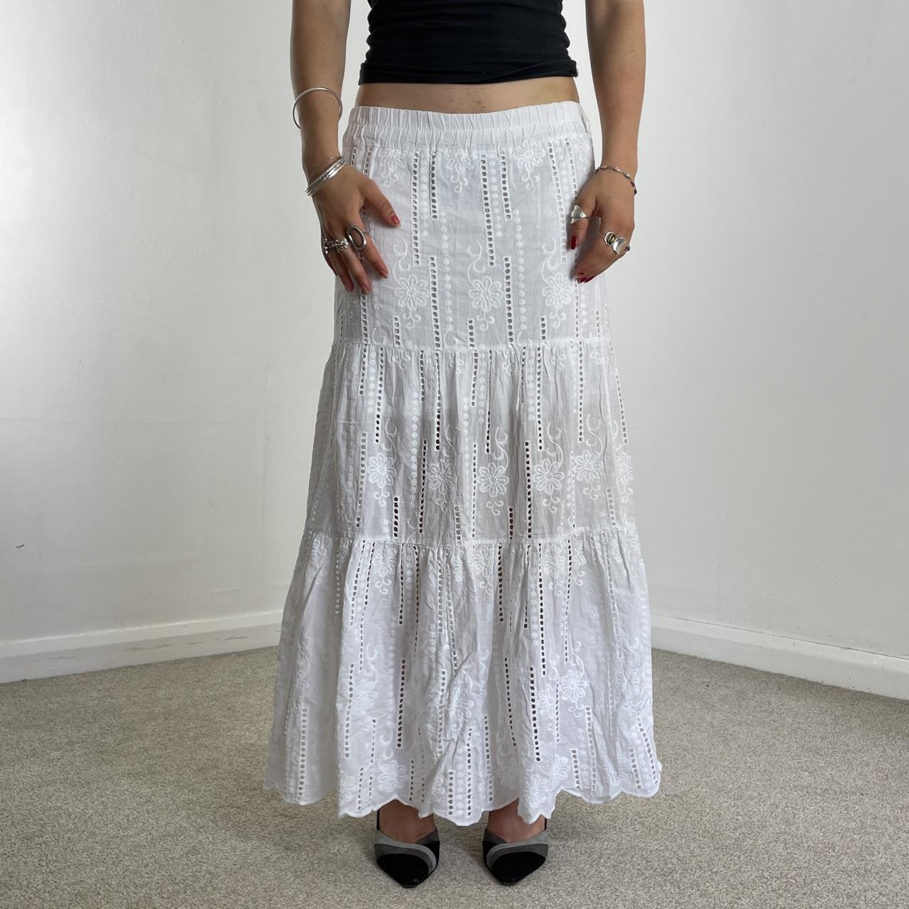 Vintage full length teired maxi skirt with embroided details.