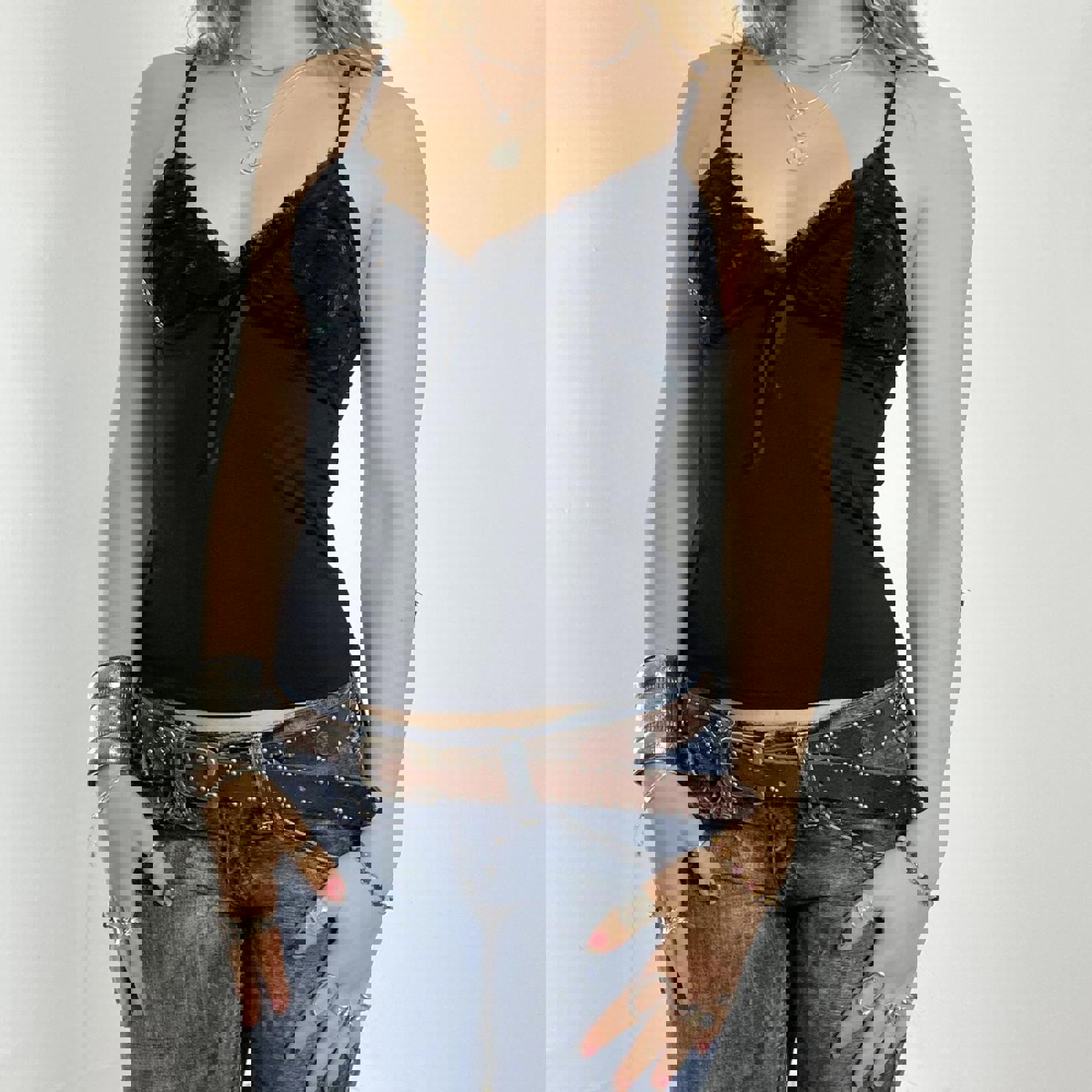 00's black cami with sequined cups and a bow under the bust