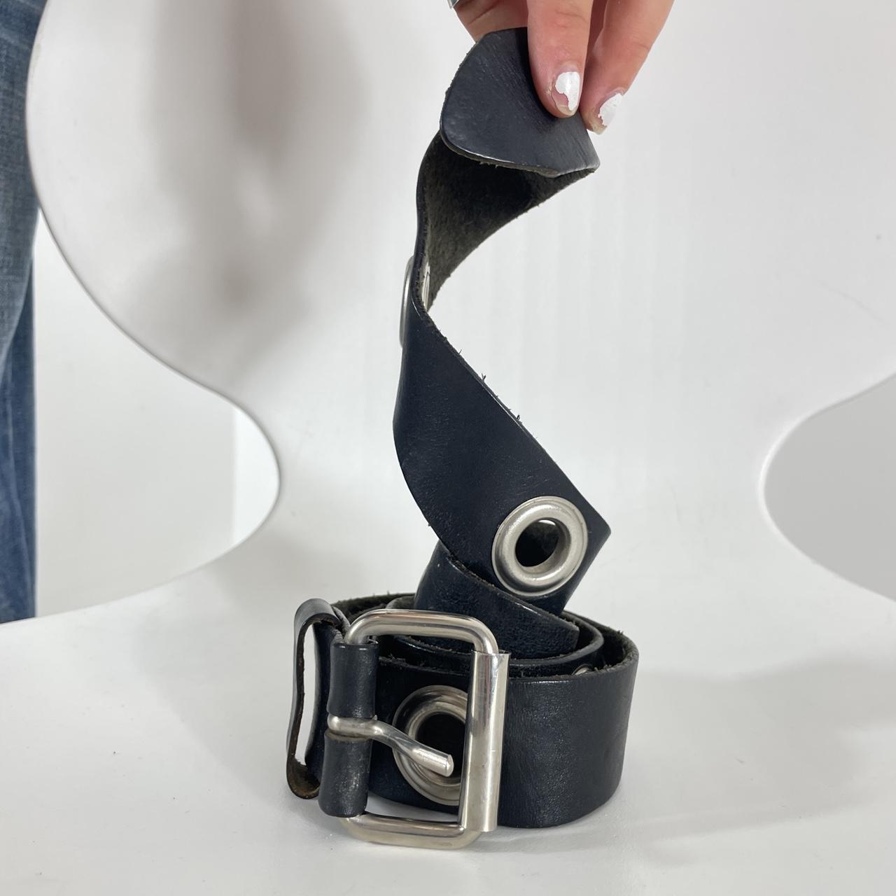 Black leather belts with silver grommets