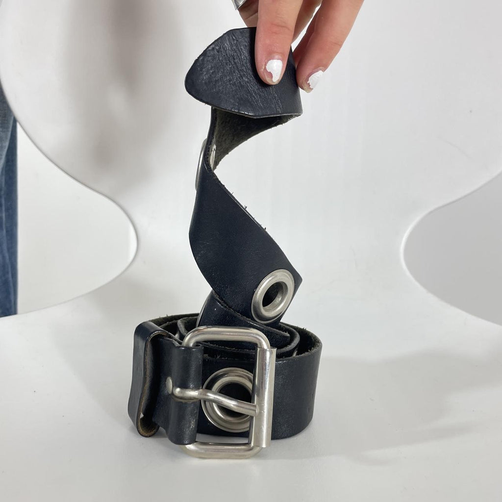 Black leather belts with silver grommets