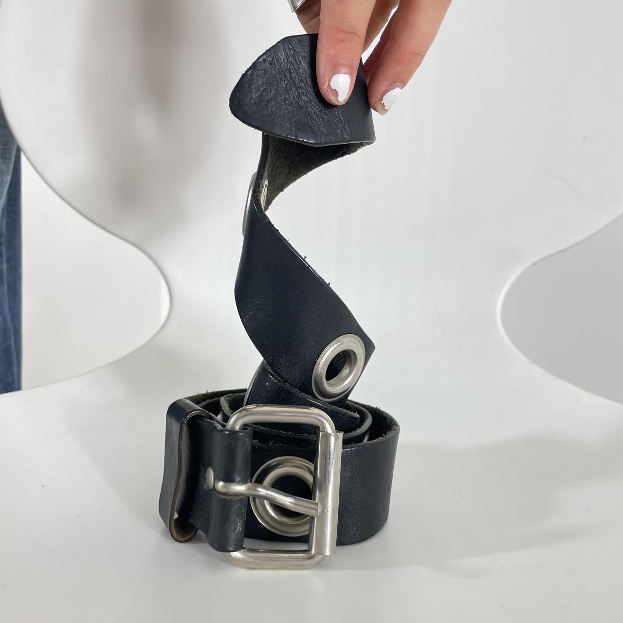 Black leather belts with silver grommets