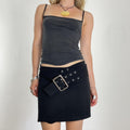 Black avant garde asymetrical buckle mini skirt
