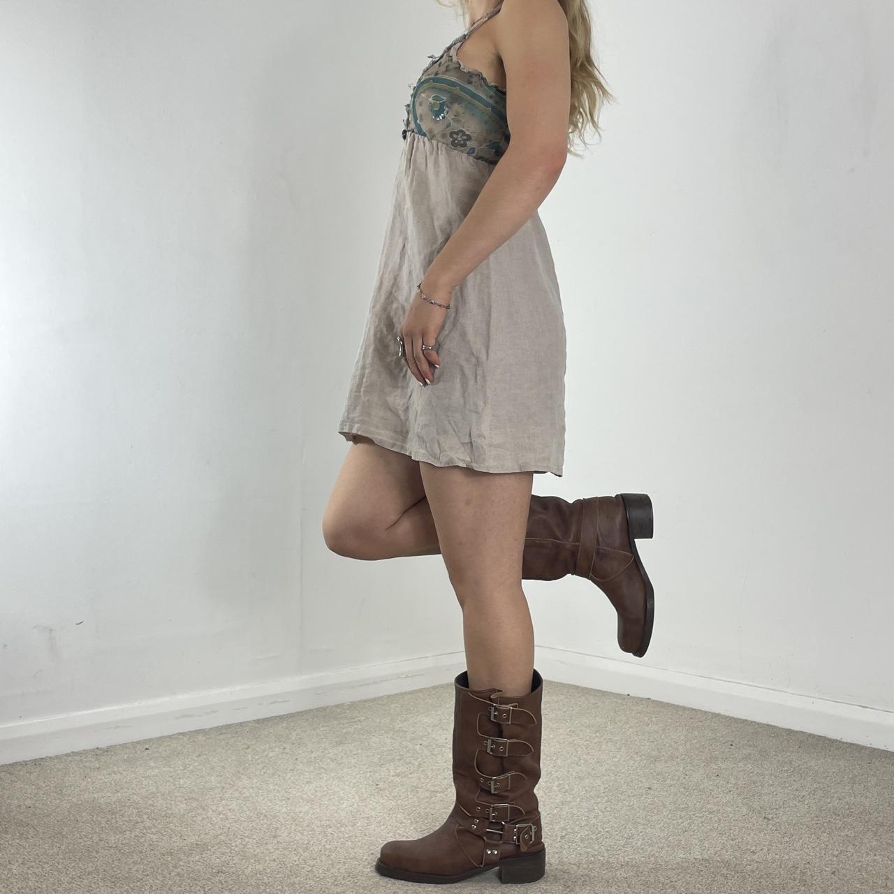 Linen cream baby doll mini dress with bohemian patterning